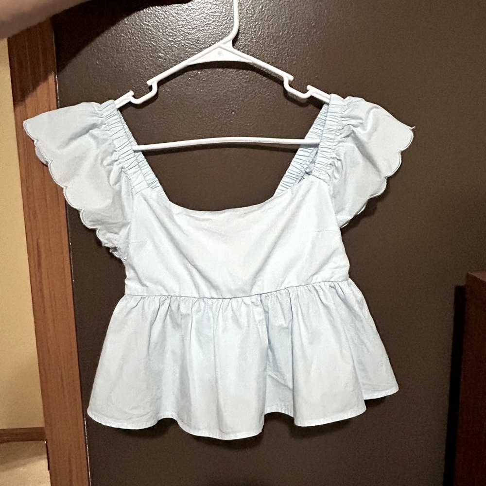 Light blue blouse; Size small; I bought it from a small boutique